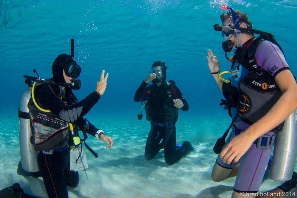Open water student practising scuba skills during training at Nakula Dive Center