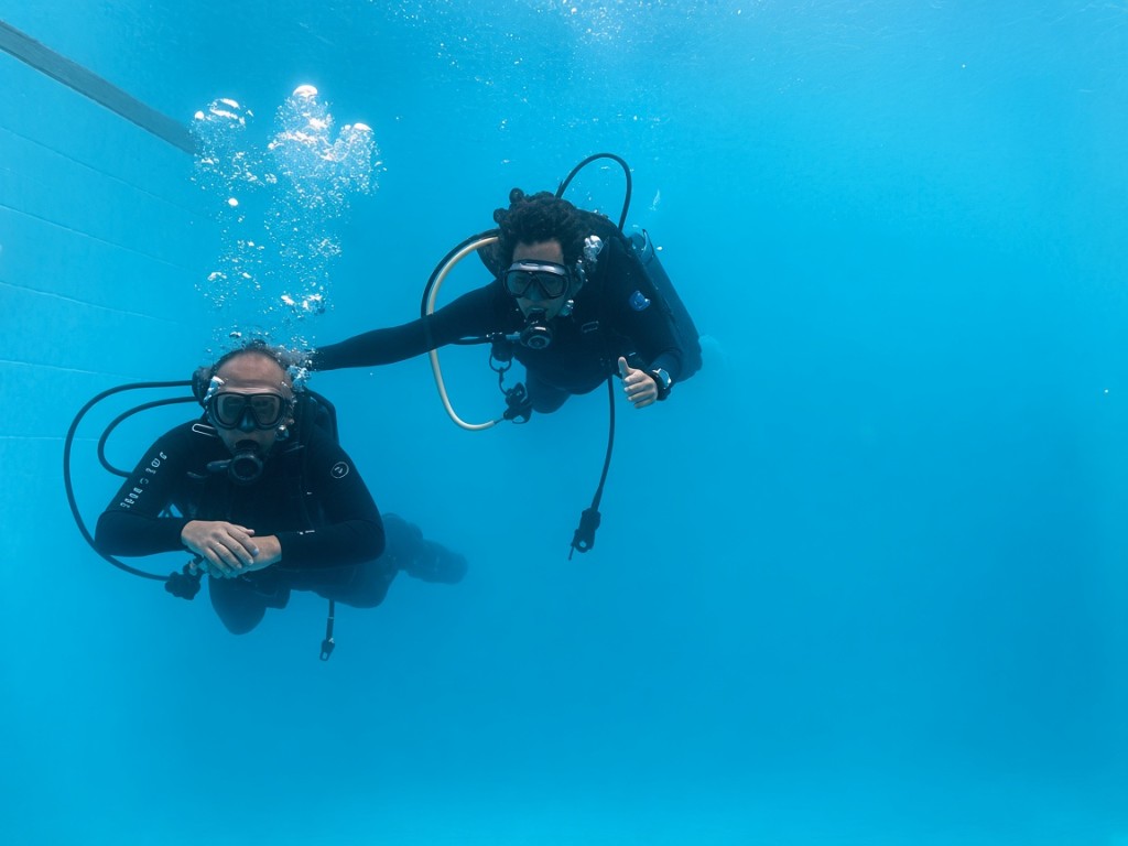 Students training with scuba gear in the Nakula pool